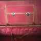 suitcase of leather with labels of palaces