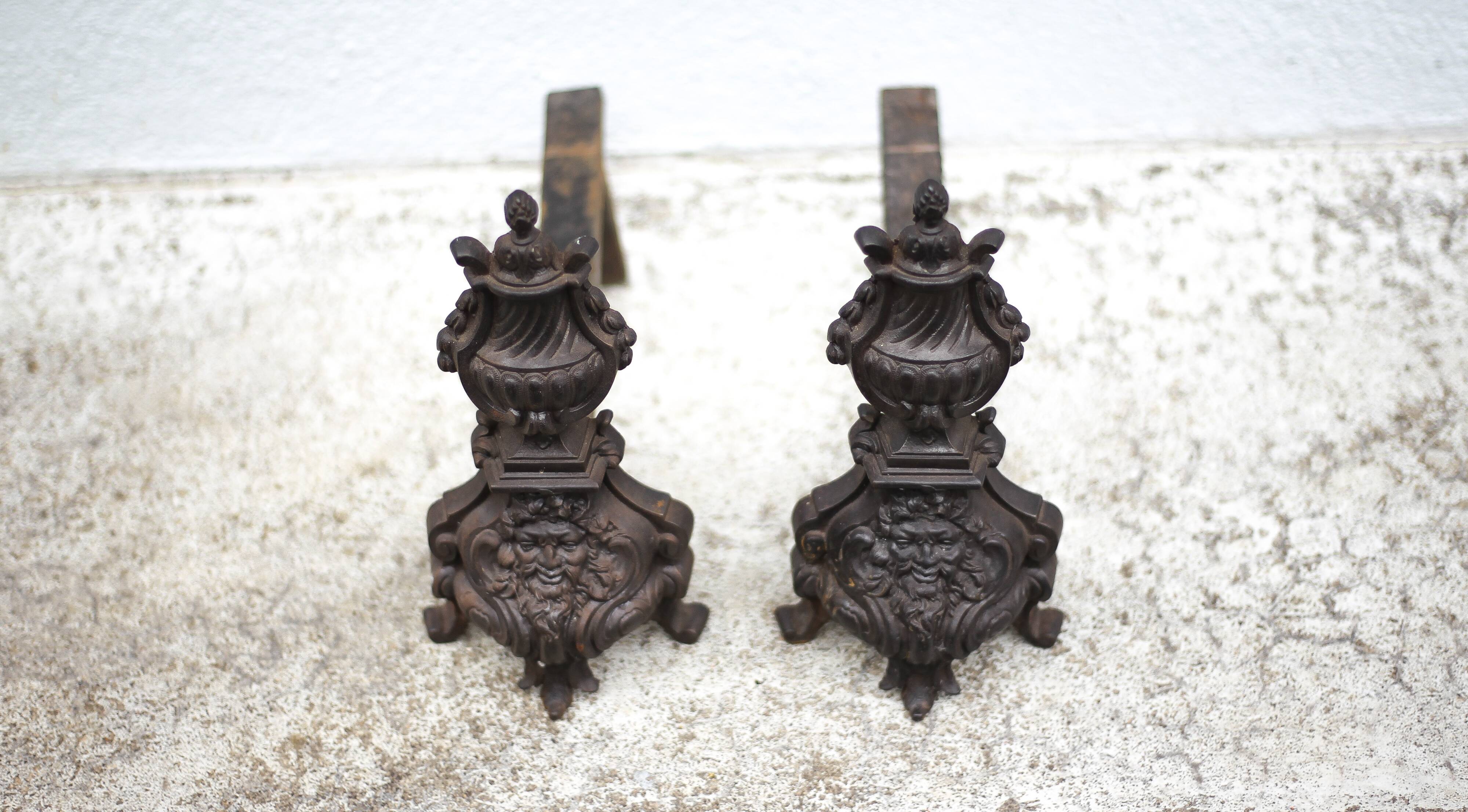 Vintage fireplace andirons, pair of cast iron Bacchus head andirons, fireplace accessories