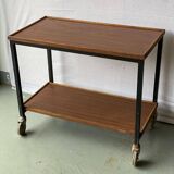 Vintage wooden and metal serving trolley on wheels with double tray