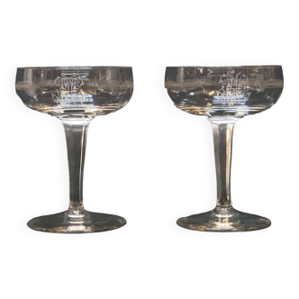 2 old champagne glasses in engraved crystal monogram mh baccarat?