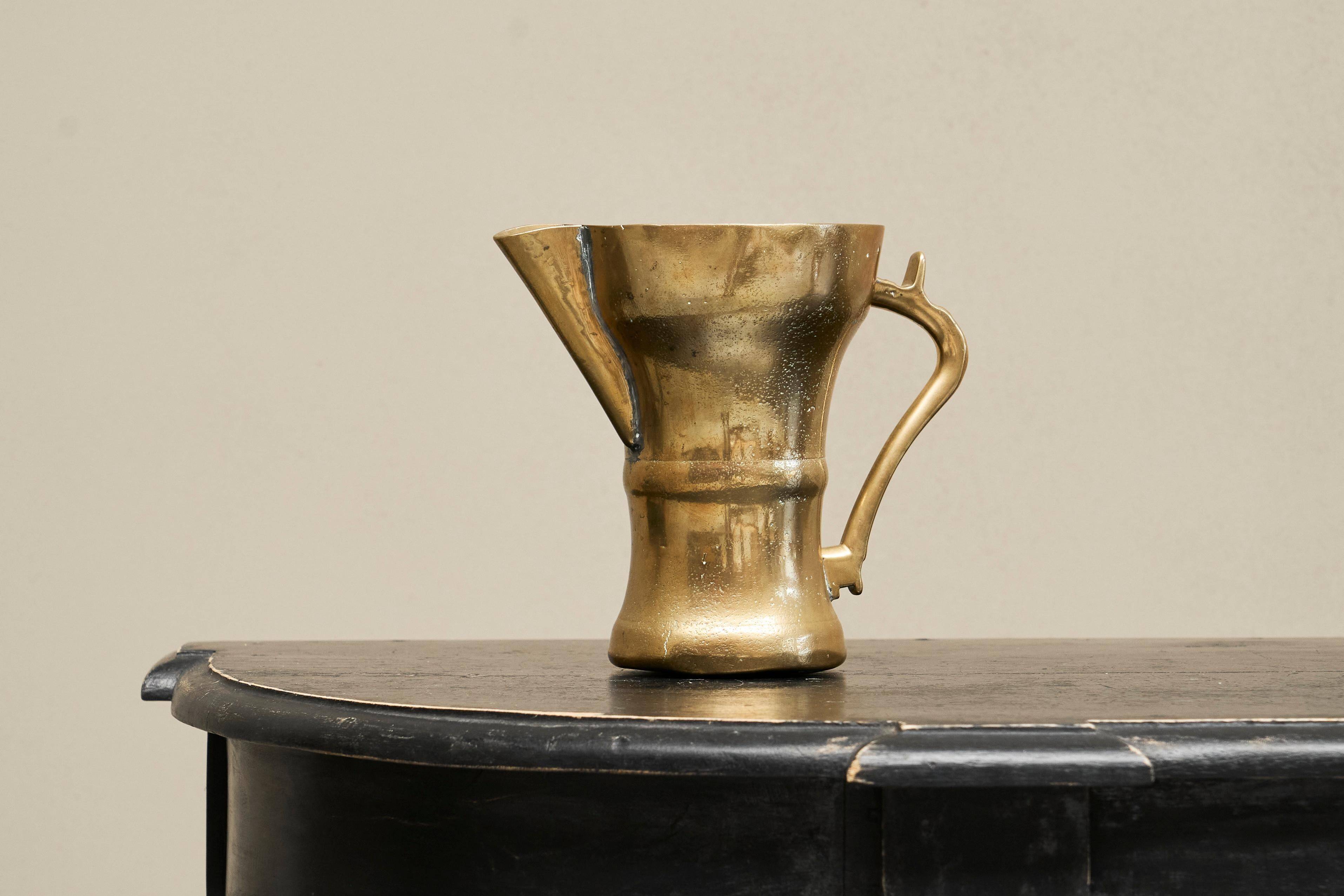 Antique brass jug, 19th century.