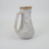 Signed white beige ceramic pitcher