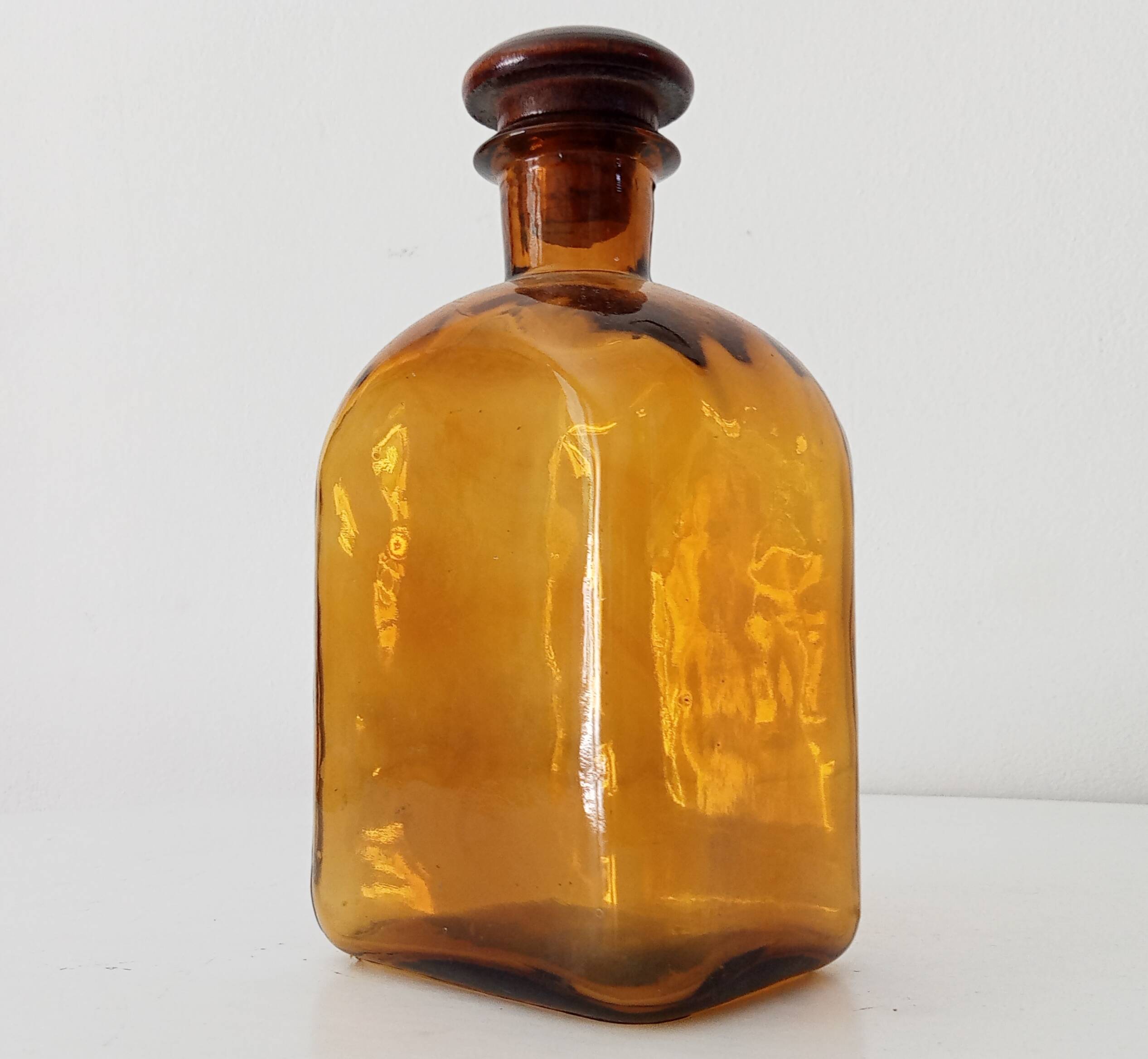 Vintage amber glass apothecary bottle