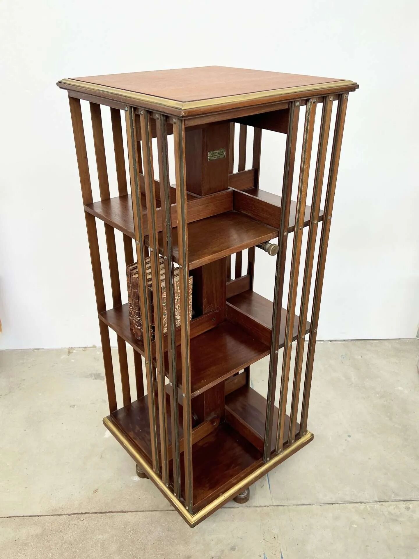 Rotating mahogany and brass library — G. Borgeaud, circa 1900