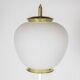 Floor lamp in opaline, lacquered metal and golden brass. 1950s.