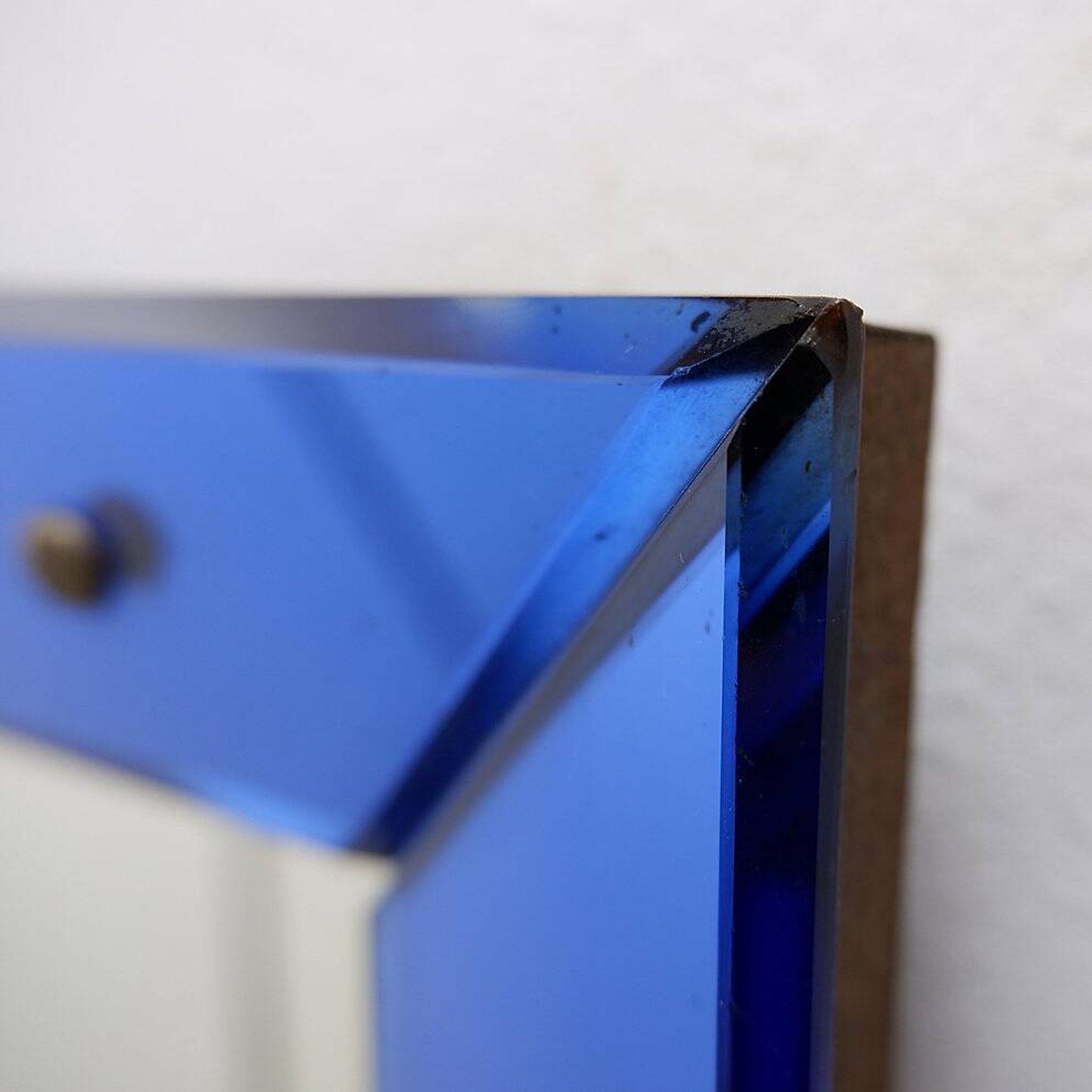 Mirror with coloured glass frame, Italy, circa 1950.