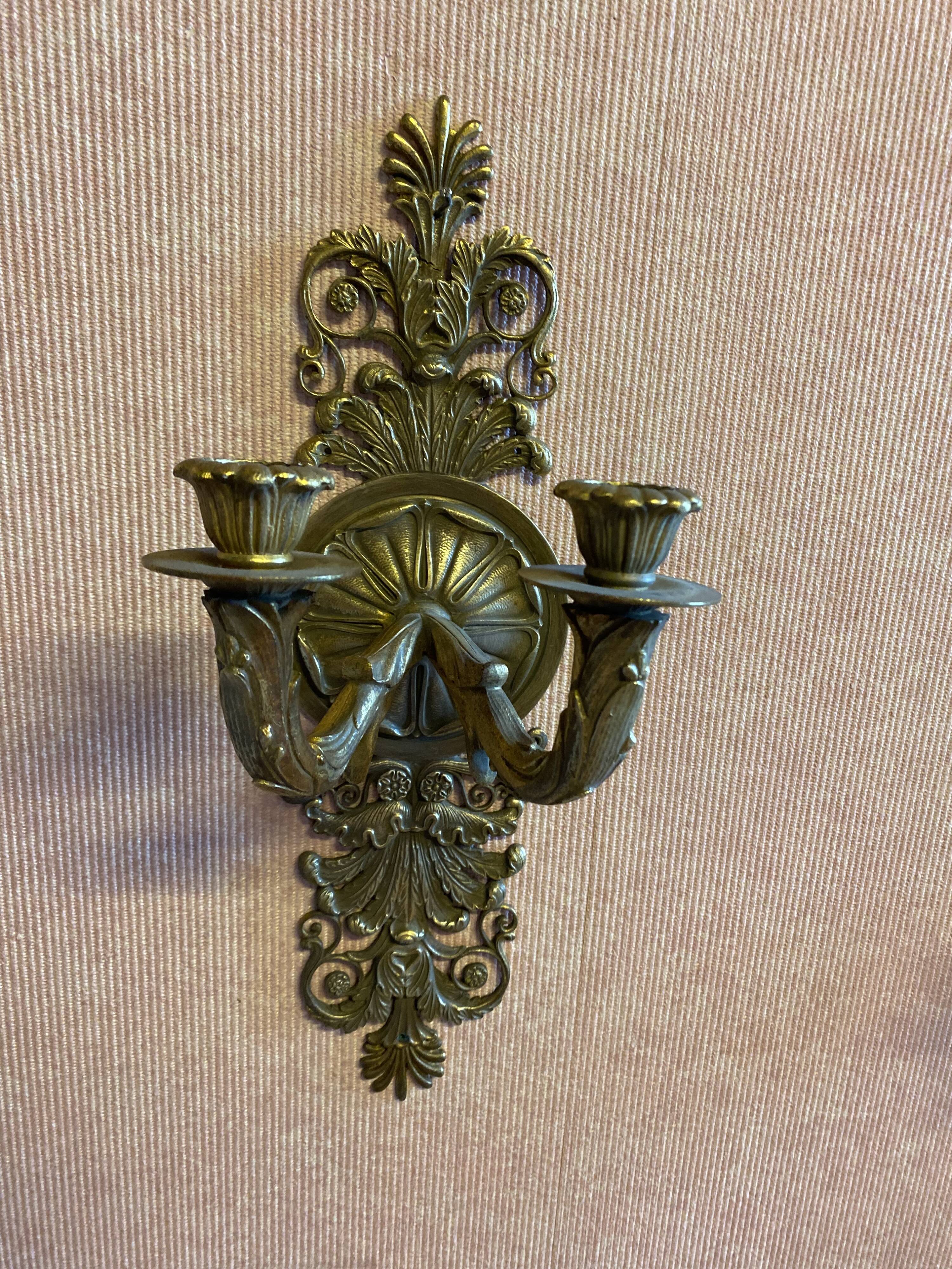 Pair of gilded bronze sconces, 2 burners, Restoration style.