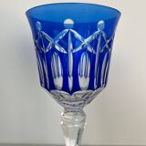 Set of twelve glasses in crystal tinted in different colours and cut with stars.