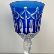 Set of twelve glasses in crystal tinted in different colours and cut with stars.
