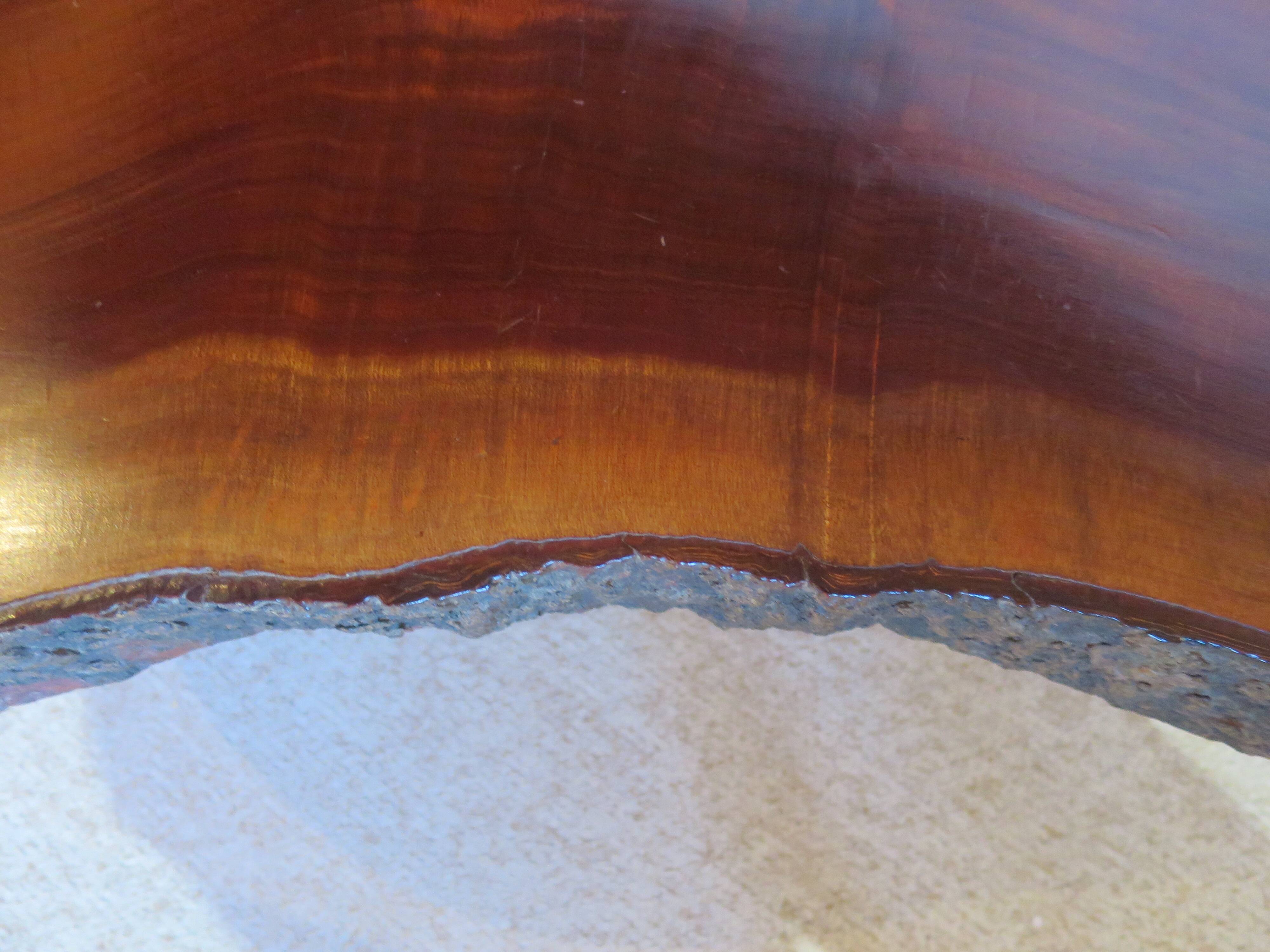 Tripod coffee table - solid okoumé wood - organic shape - brutalist style