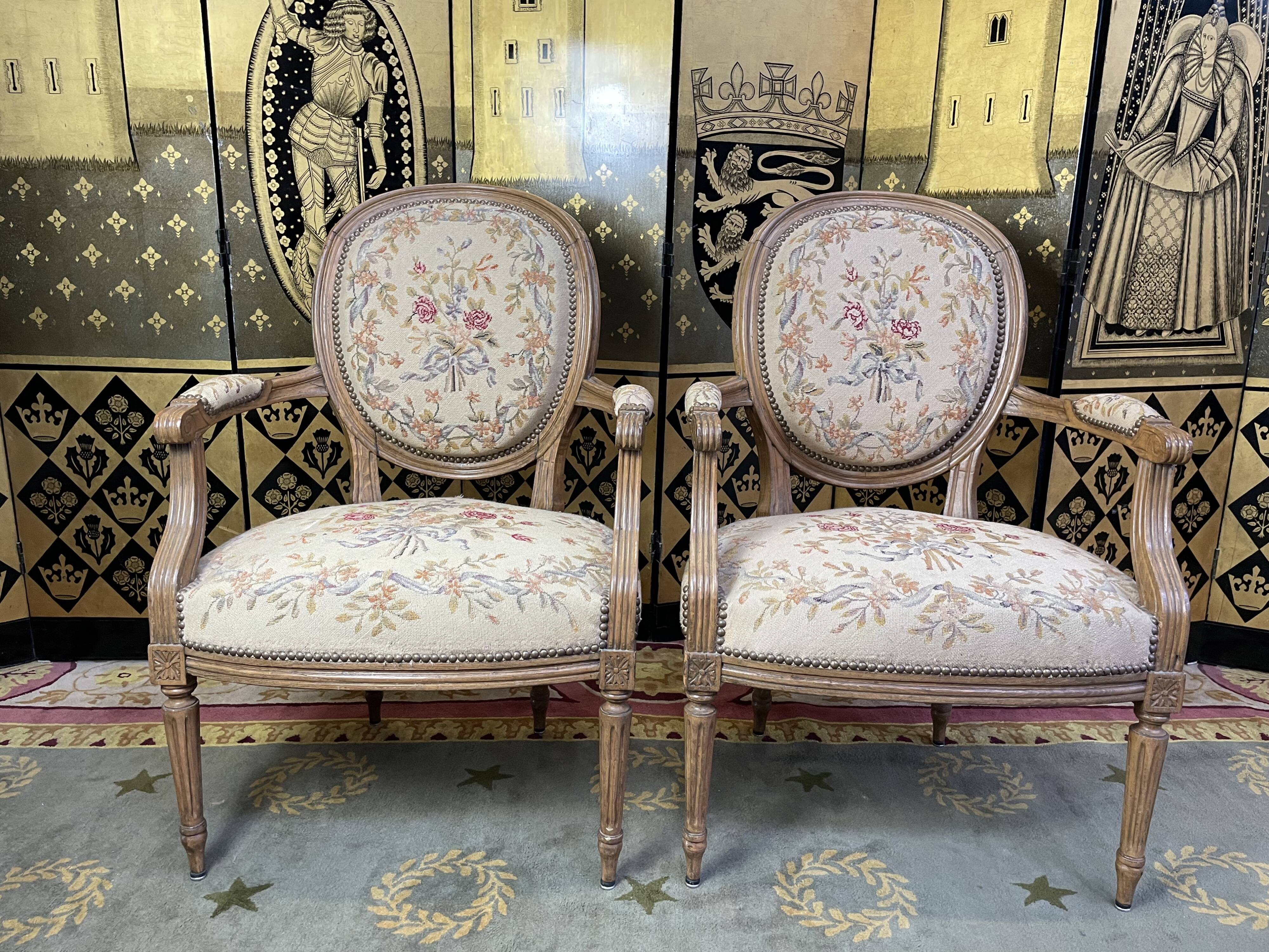 Pair of Louis XVI period medallion armchairs