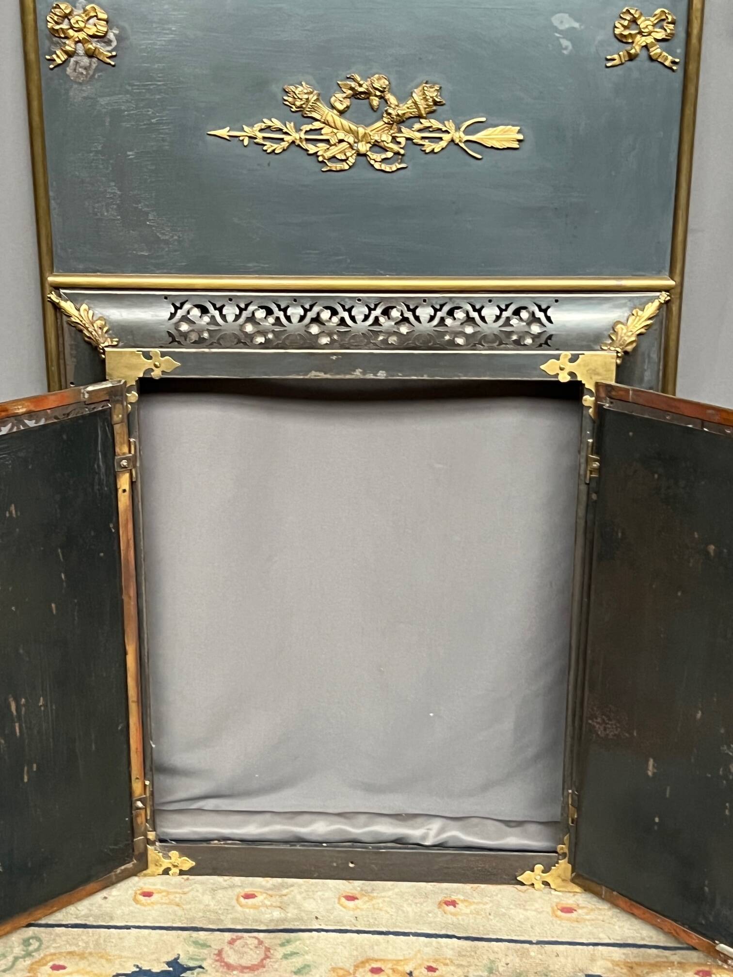 Fireplace screen. Bronze, copper, metal, gilding.