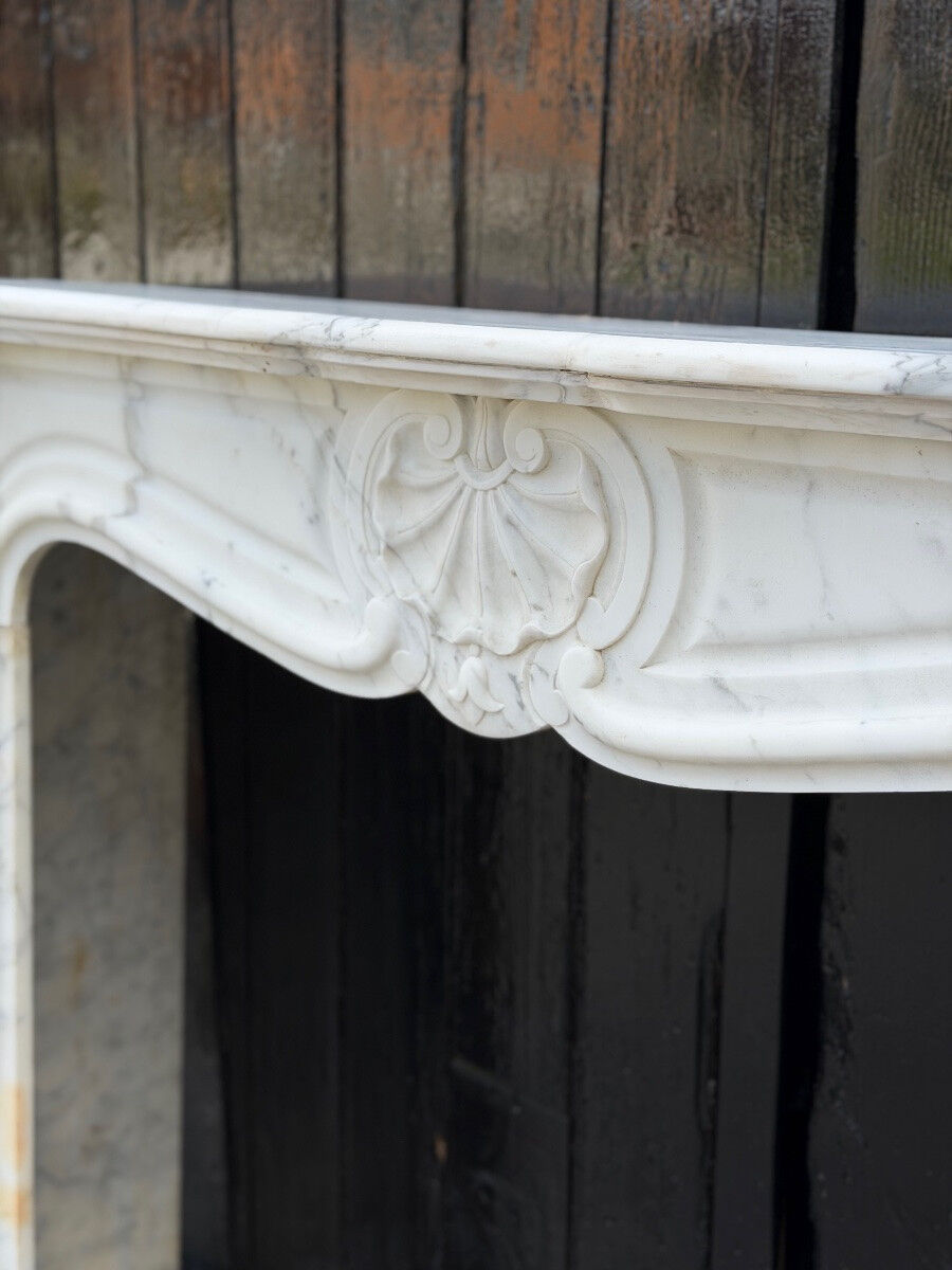 Louis XV style fireplace in Arabescato Carrara marble, circa 1880.