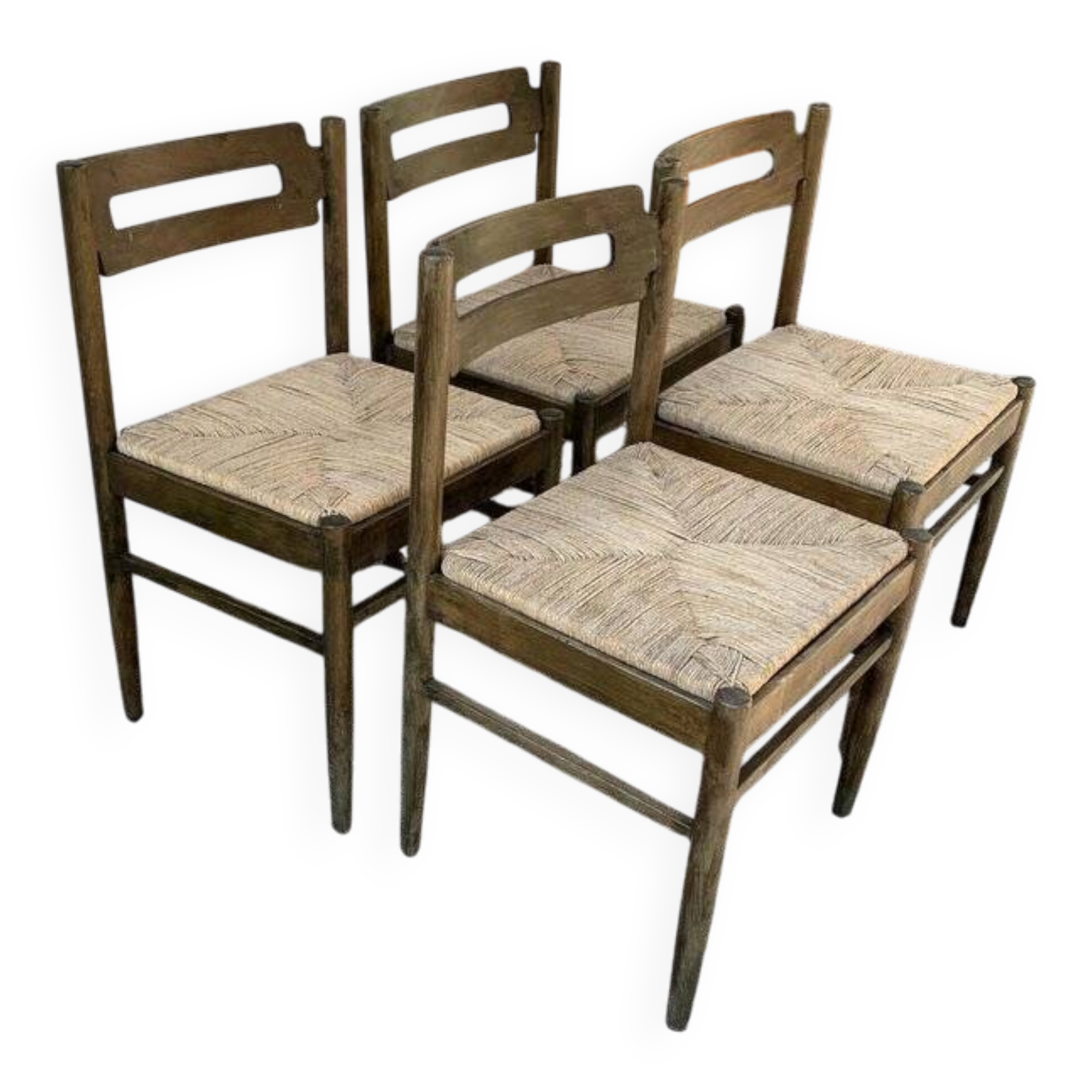 Set of 4 brown wooden dining chairs with straw seats, 1970s.