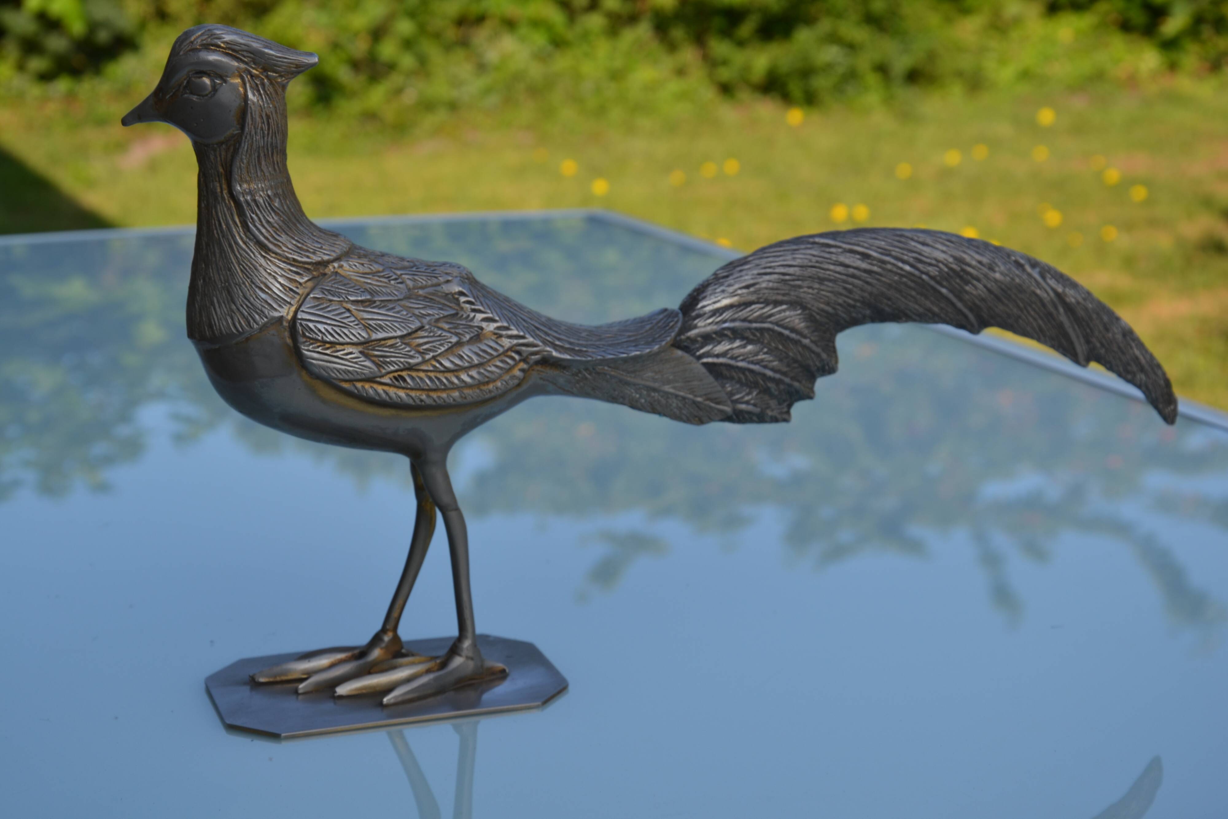 Brass peacock sculpture