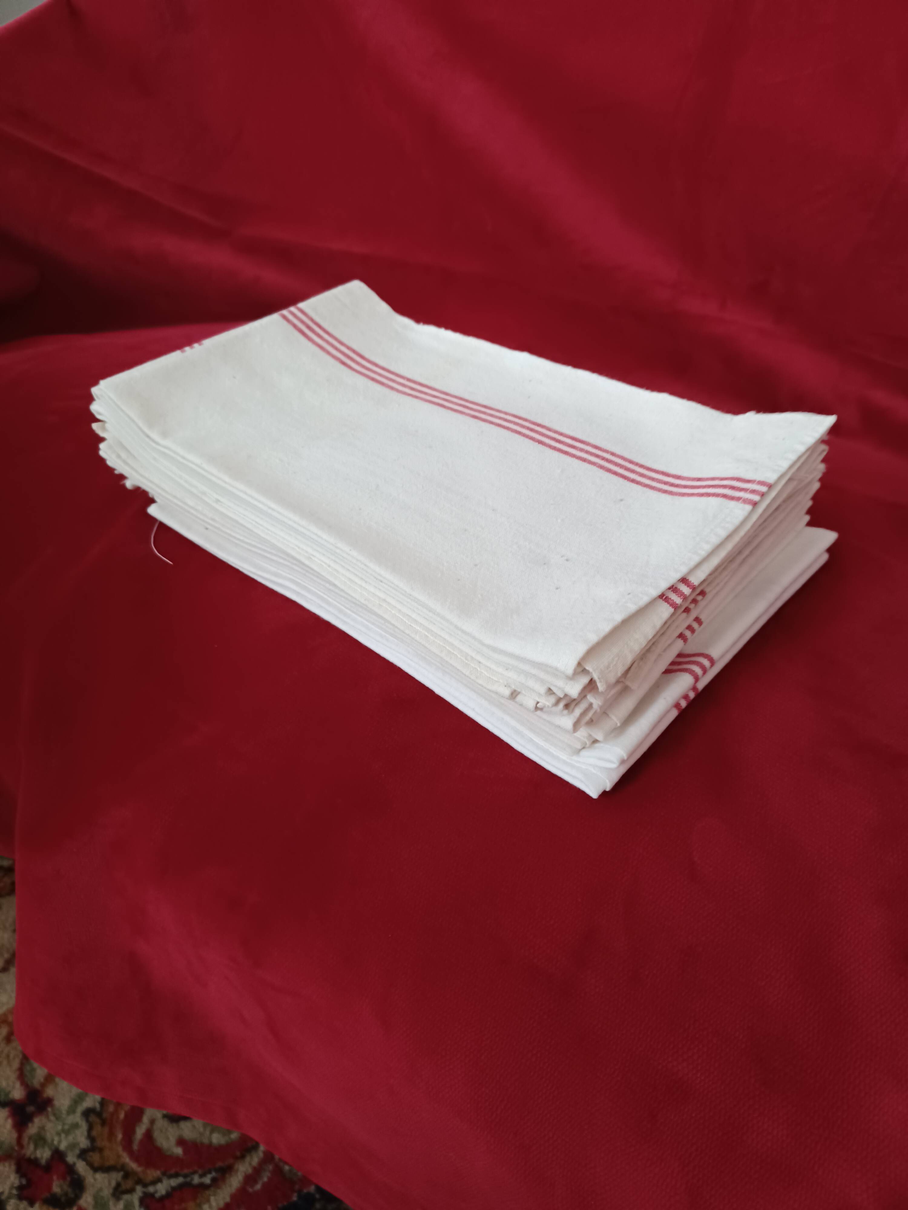 Old red battens tea towels