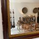 Black lacquered stucco mirror