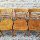12 varnished bistro chairs