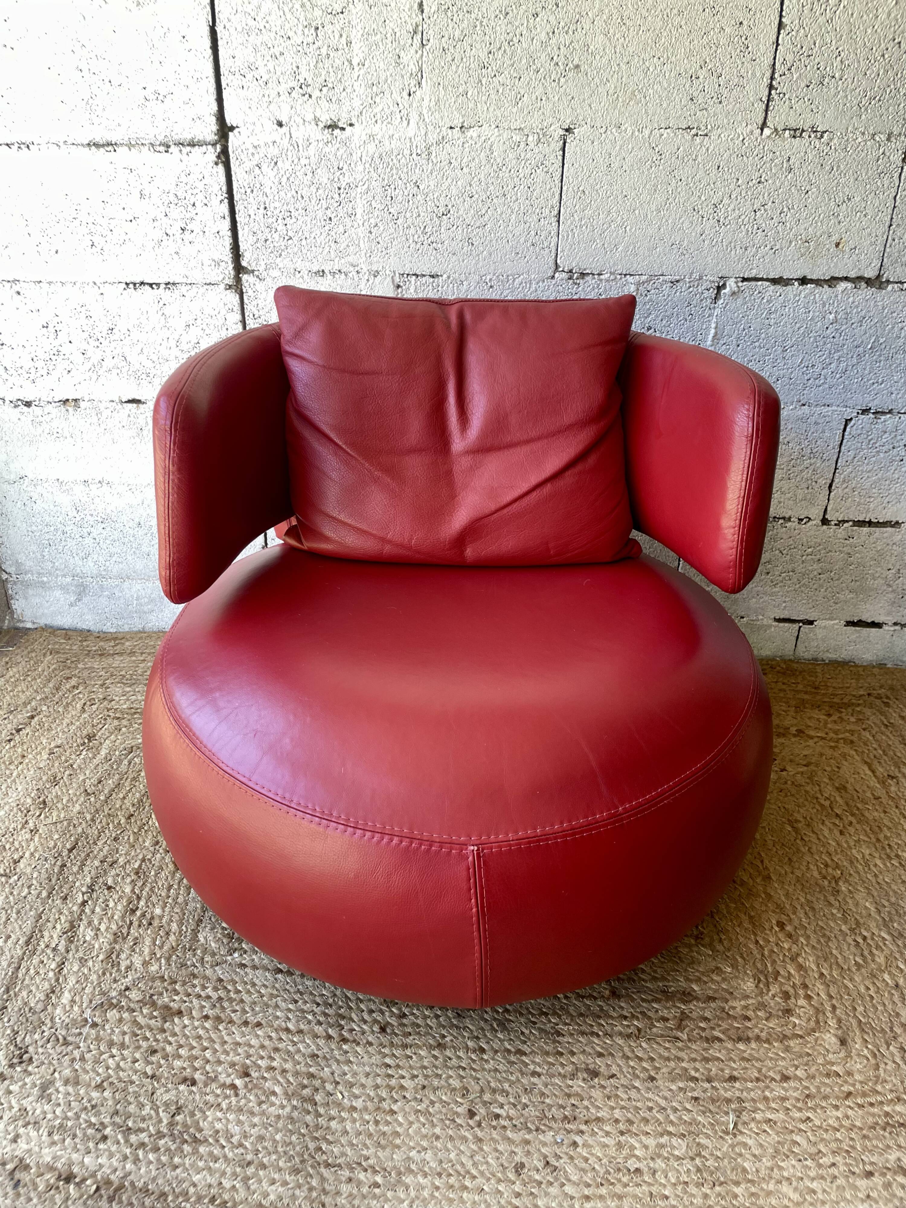 Curl armchair in red leather by Roche Bobois