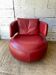 Curl armchair in red leather by Roche Bobois