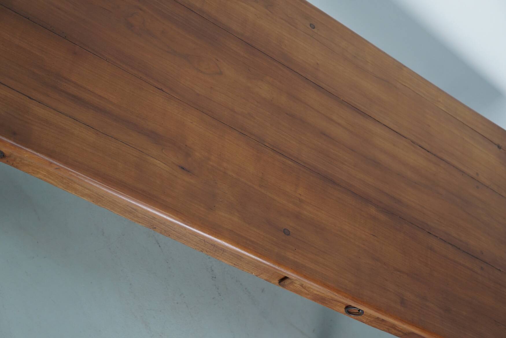 Rustic dining table in fruitwood from the early 20th century