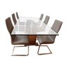 Table en verre et chaises en cuir