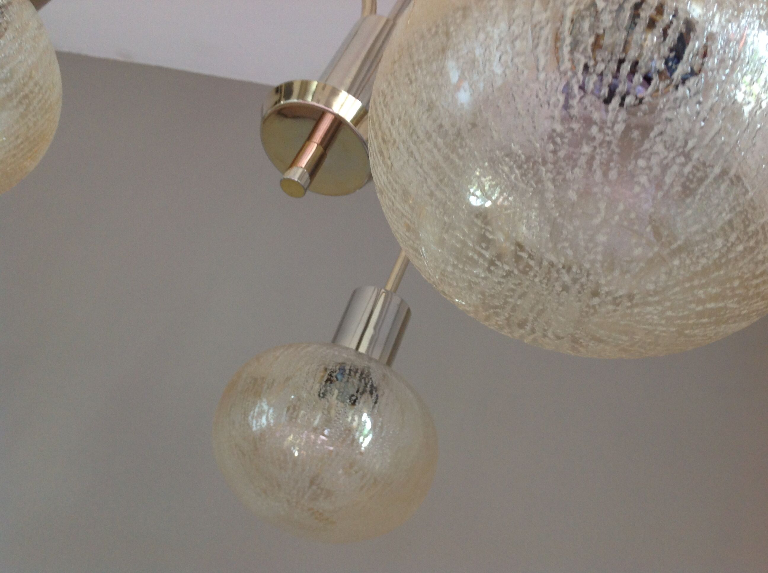 Three-globe brass chandelier in amber/vintage glass 60s-70s