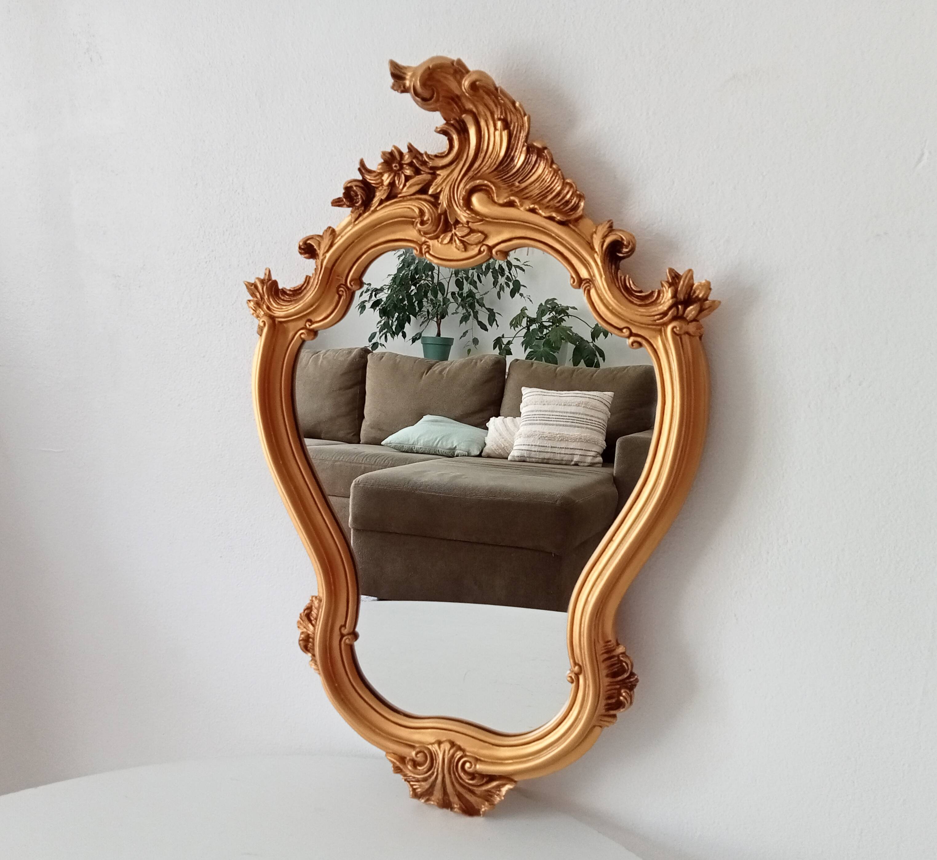 Vintage rococo mirror in gilded resin