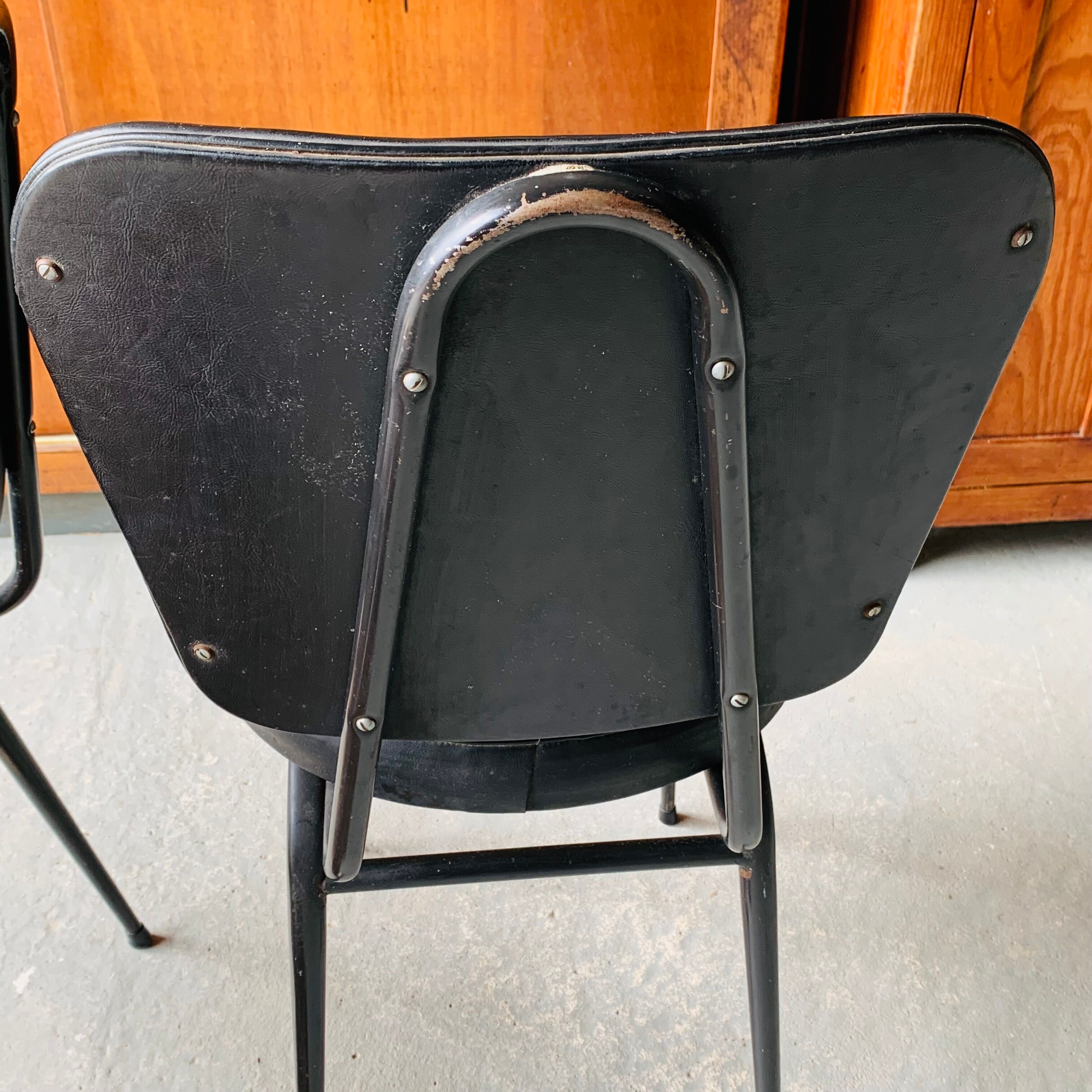 Pair of vintage black skai chairs
