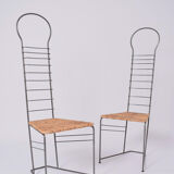Pair of iron and straw chairs, 1980s.