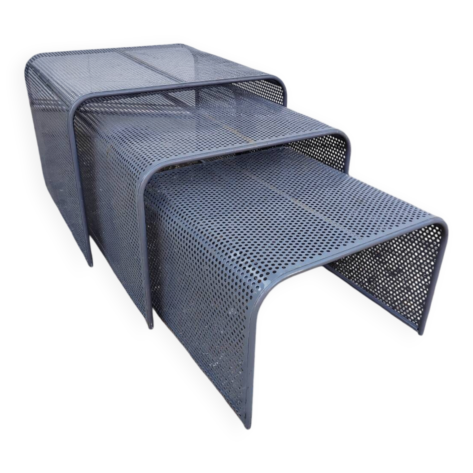 Nested tables with perforated metal from the 1980s.