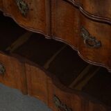 Antique baroque oak commode from the late 18th century with cabriole legs.