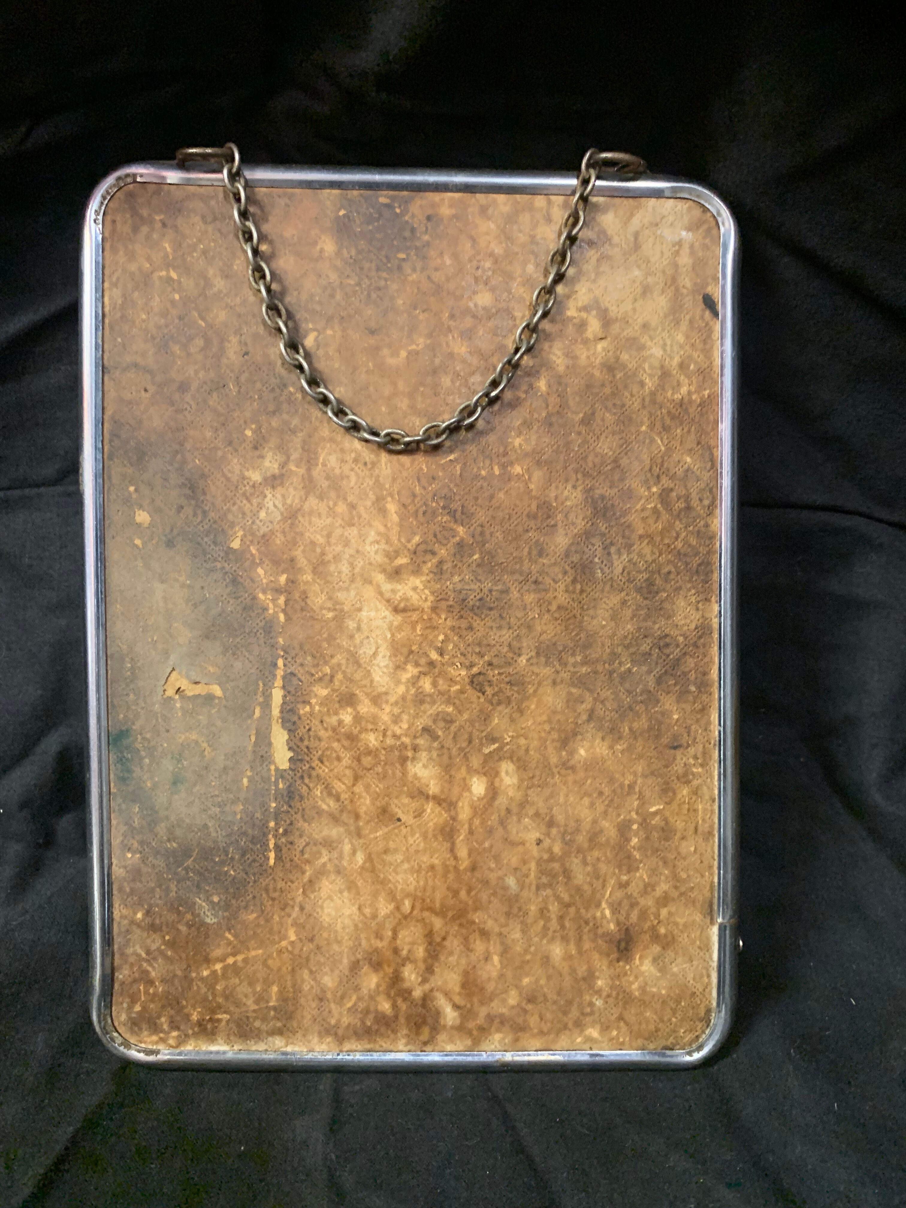 Old barber mirror with chain