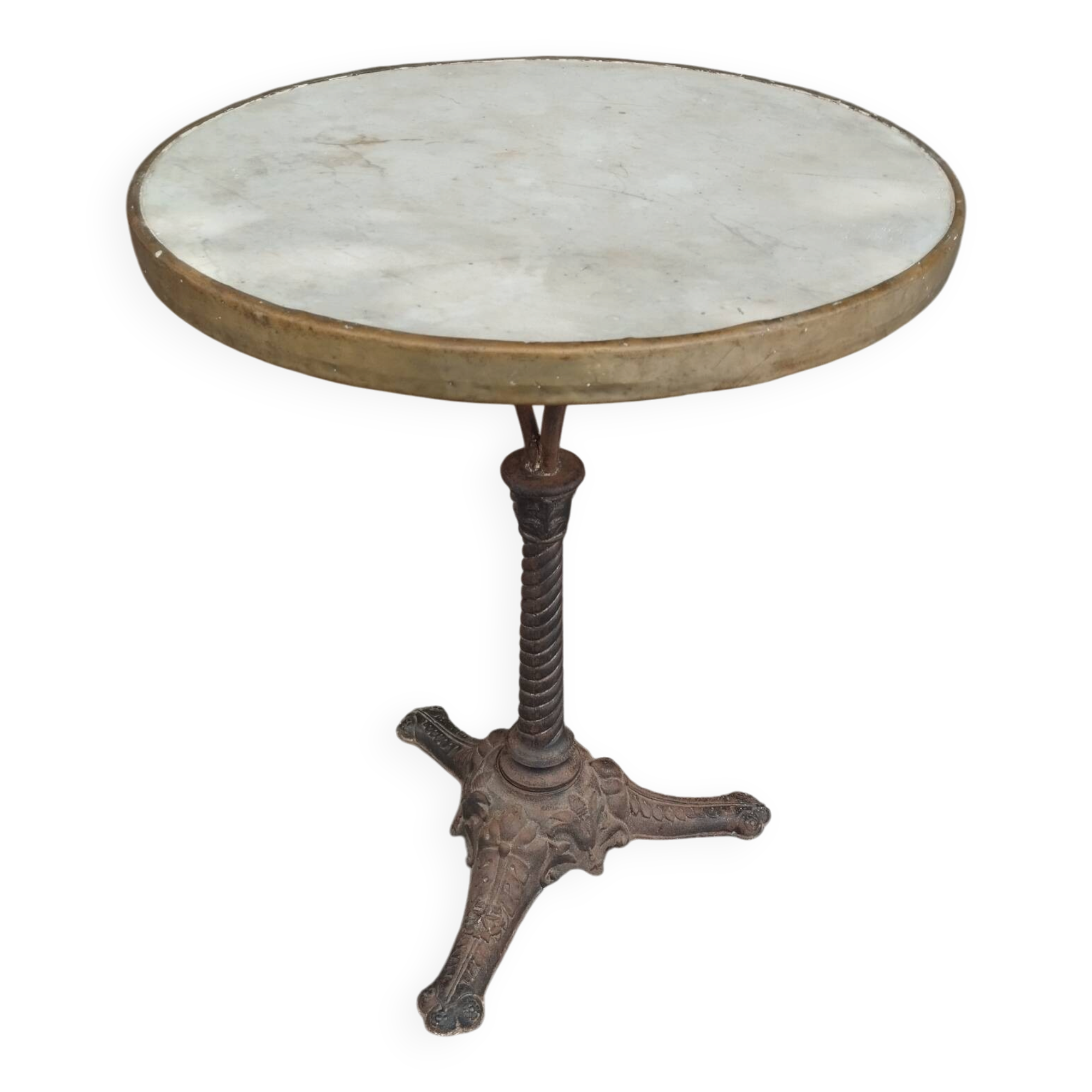 Old bistro table with marble top and cast iron base.