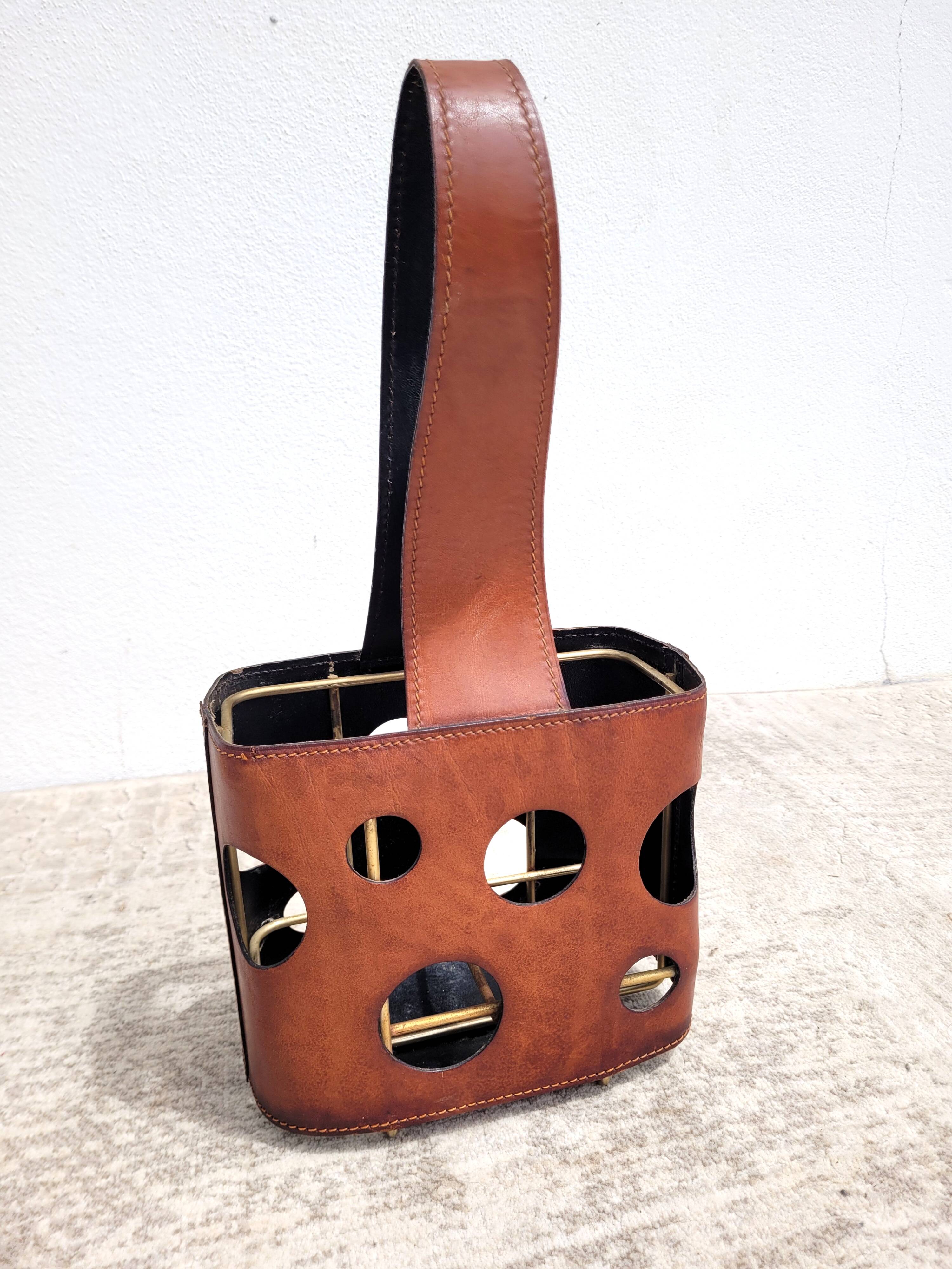 Modernist leather bottle holder 1960