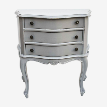 Sauteuse commode courbée trois tiroirs bois patiné gris clair