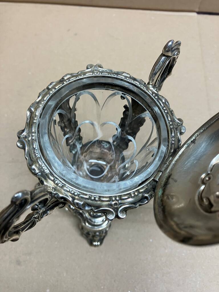 A lovely Regency-style silver mustard pot from the 19th century.