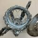A lovely Regency-style silver mustard pot from the 19th century.
