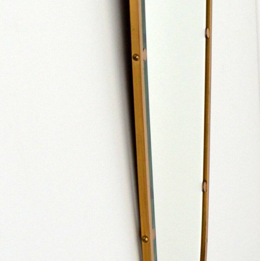 Superb free-form mirror in solid brass from the 50s/60s vintage.
