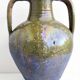 Ancient oil jar in glazed terracotta, khaki green — Auvergne, Lezou