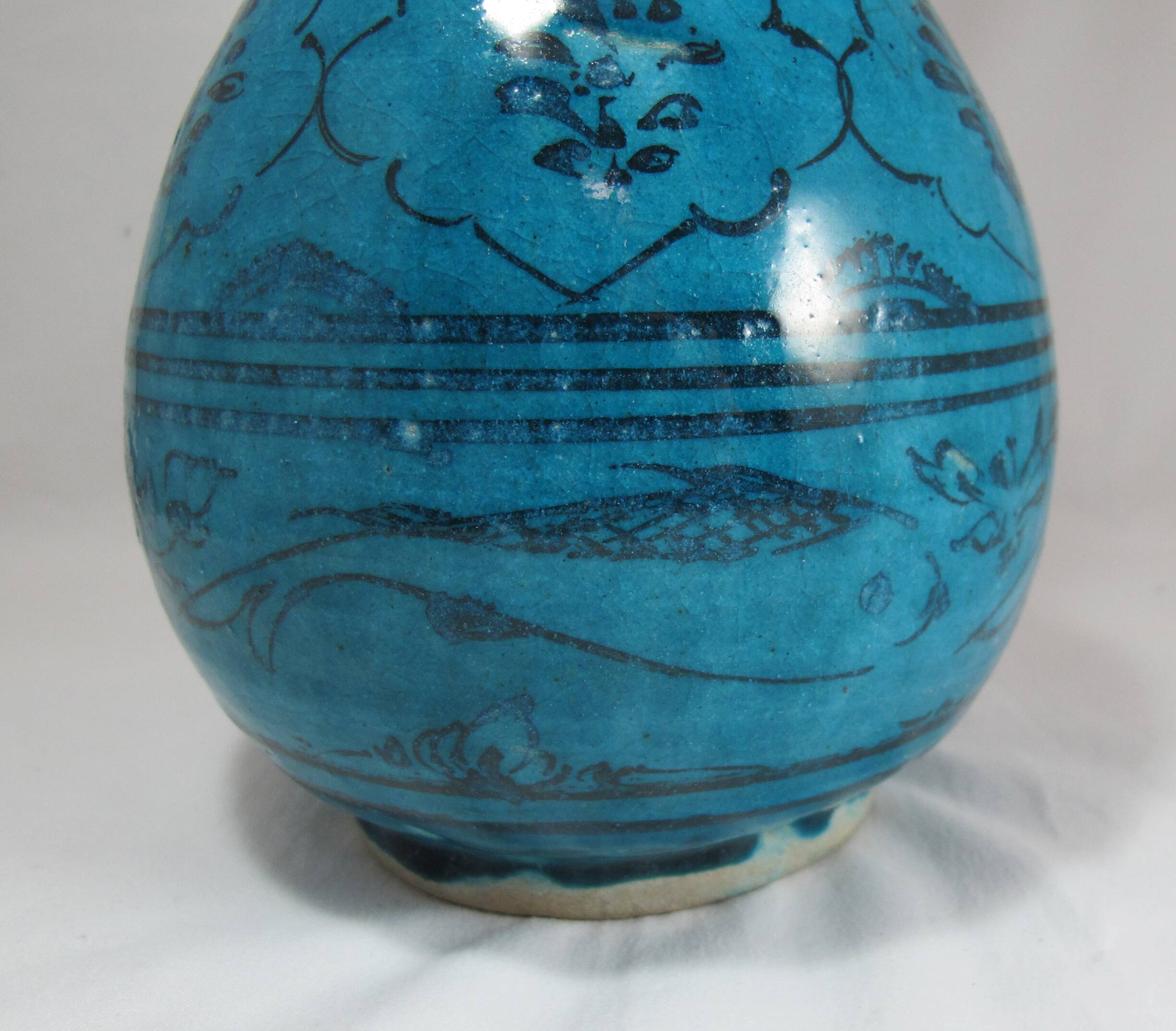 Islamic ceramic vase with turquoise background
