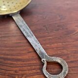 Large skimmer in brass and wrought iron, early 20th century