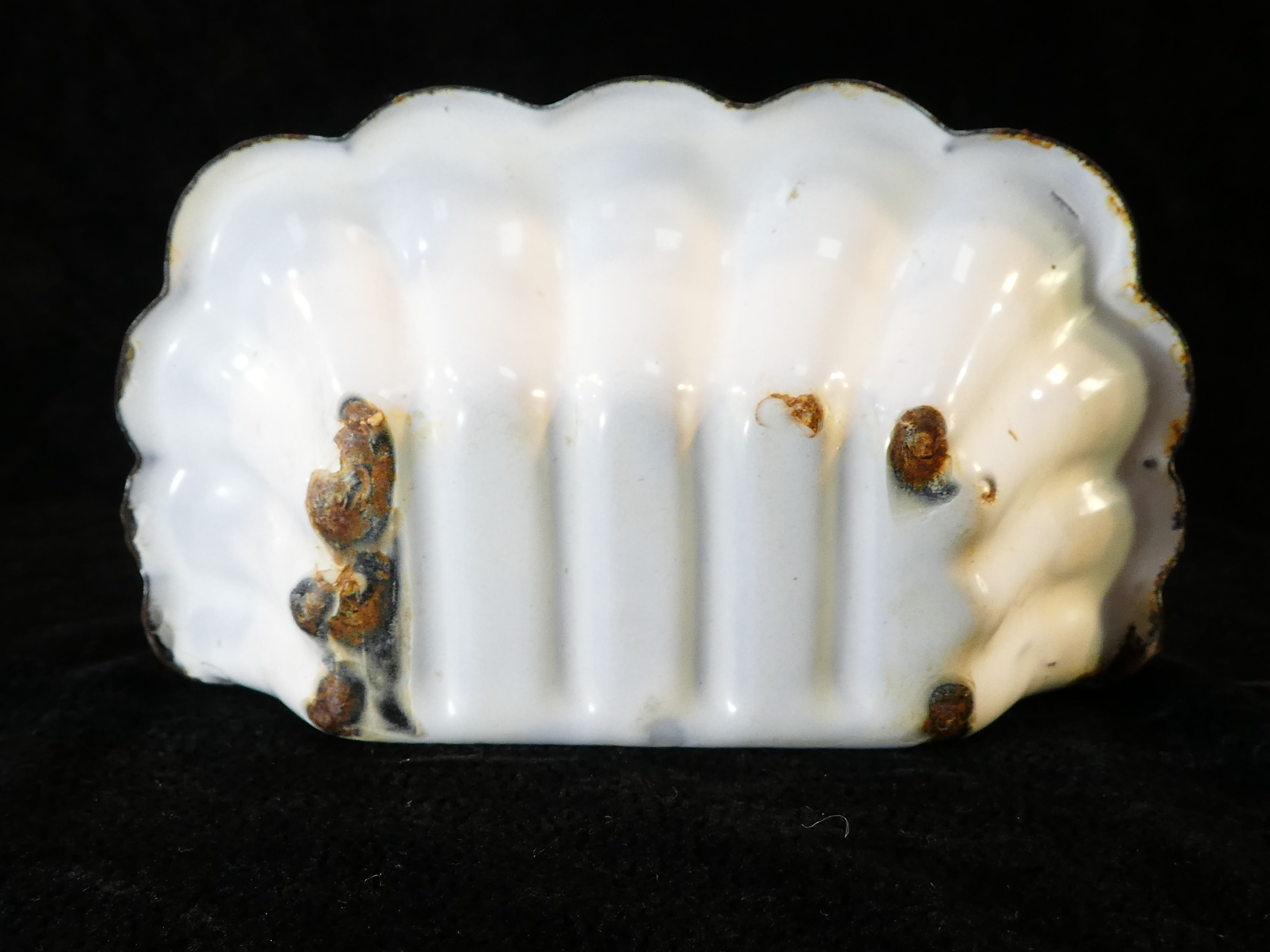 Old white enamelled sheet soap dish