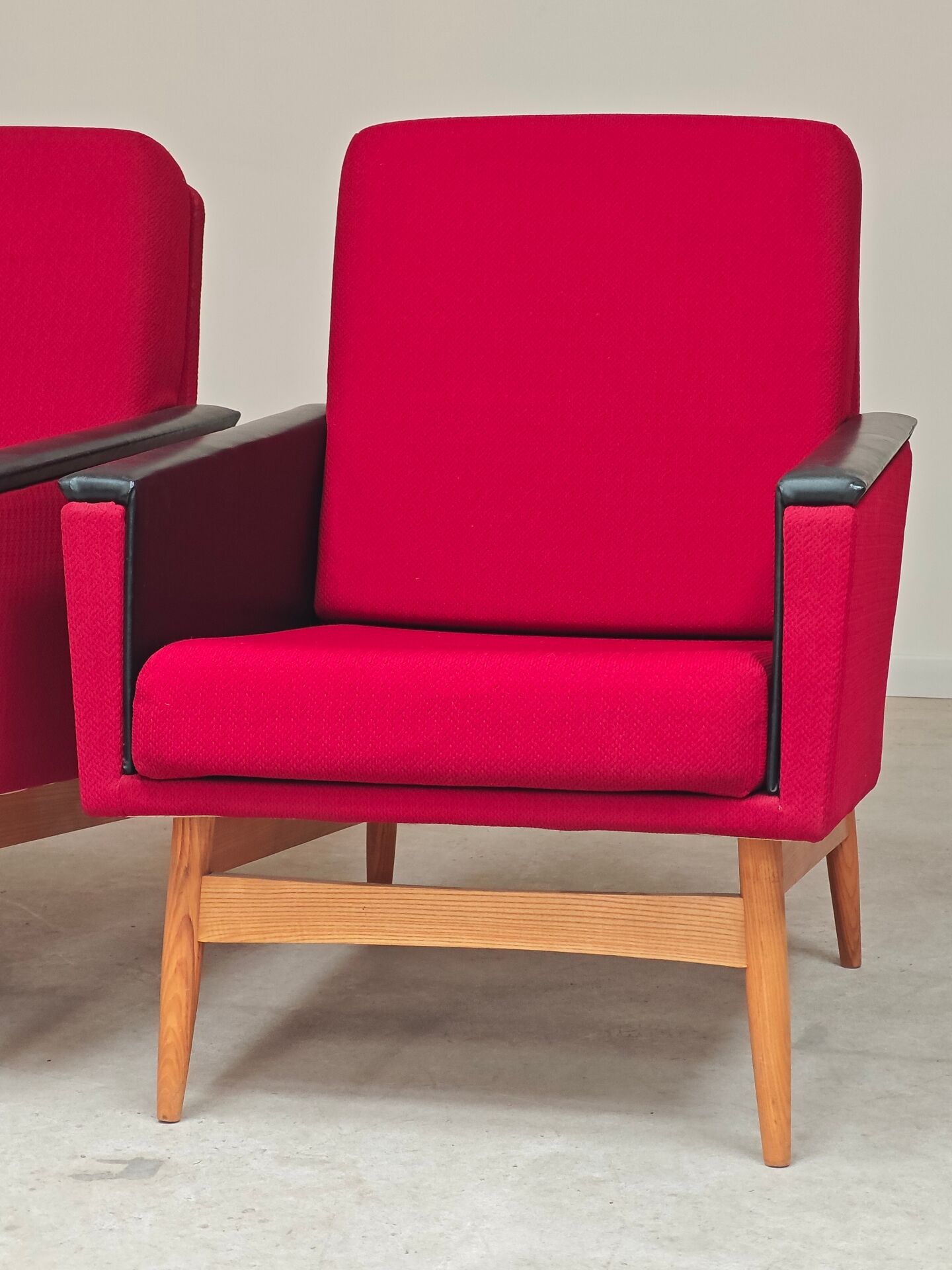 Pair of Drevotex Zamberk armchairs, red fabric and faux leather 1970