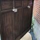 Cloakroom with sage green wall coats