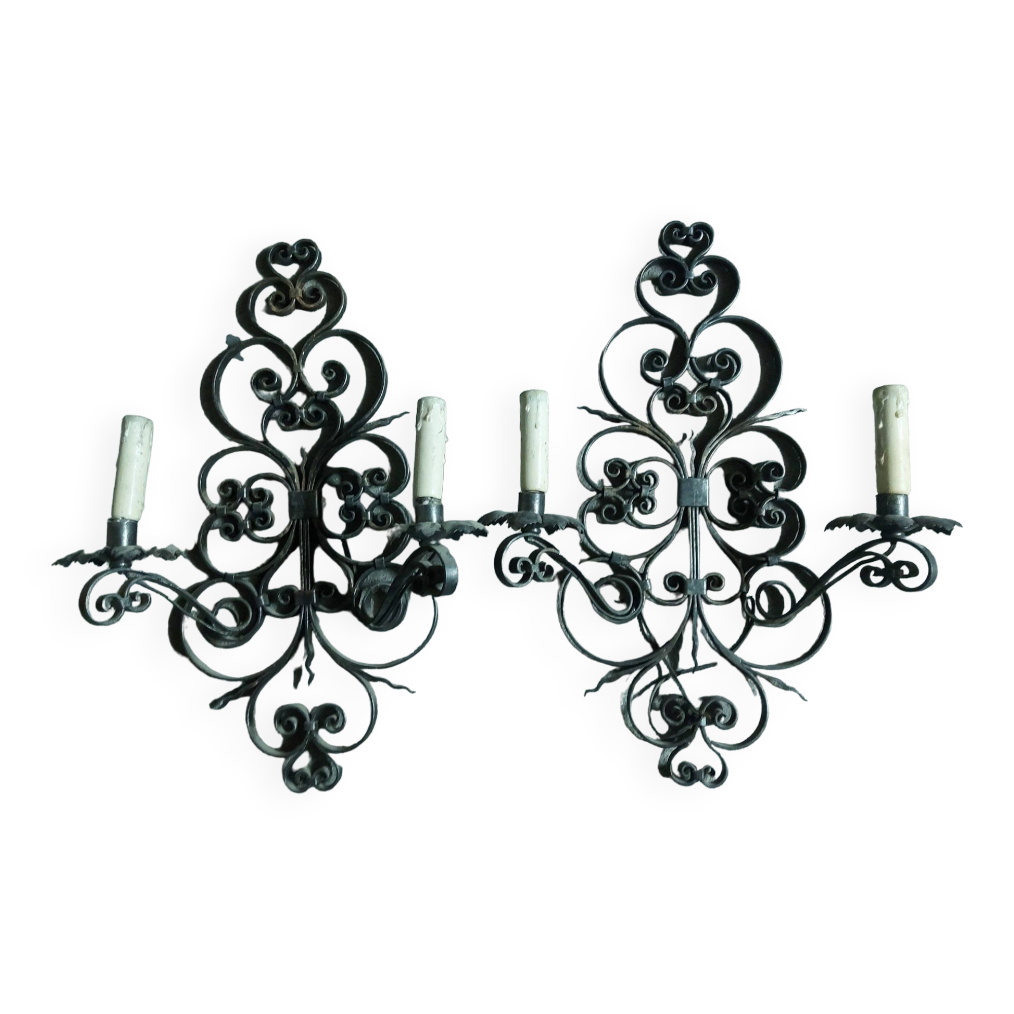 Two large wrought iron wall lights
