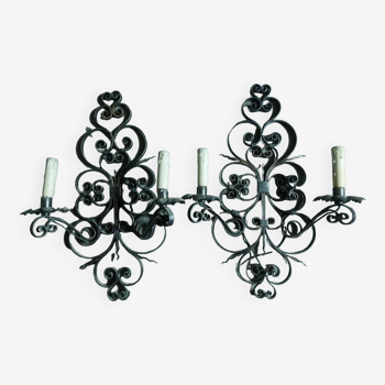 Two large wrought iron wall lights