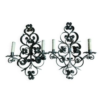 Two large wrought iron wall lights