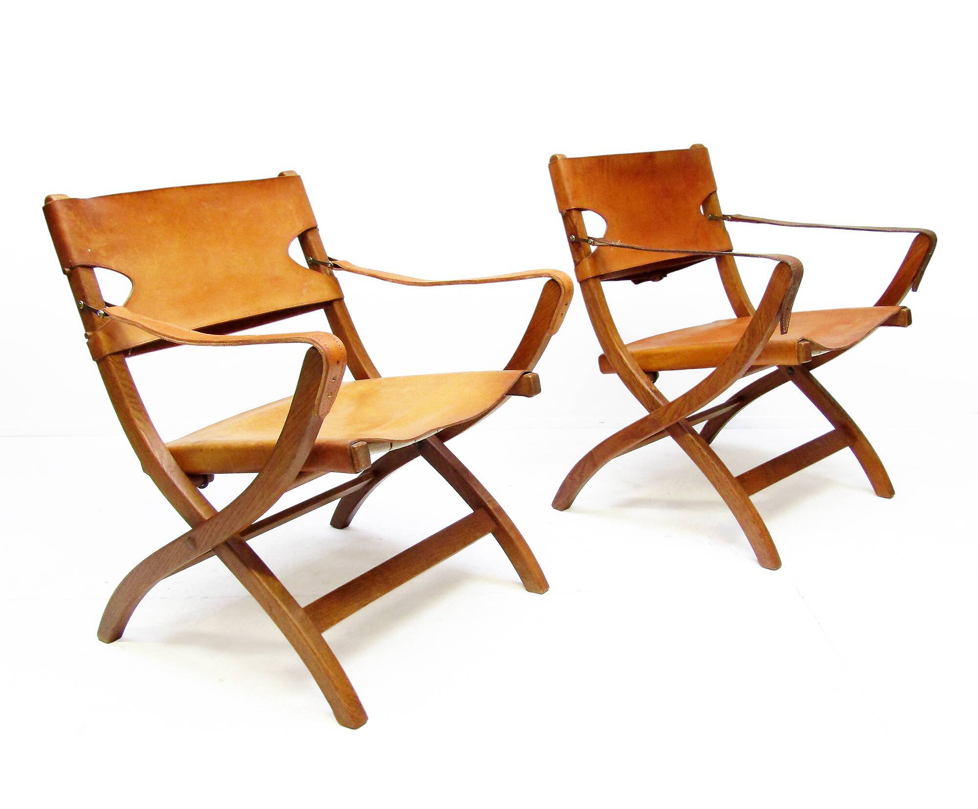 Two 1950s Danish Safari Chairs In Oak & Hide Leather by Poul Hundevad