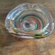 Clear with a soft coloured swirl pattern, round, glass ashtray